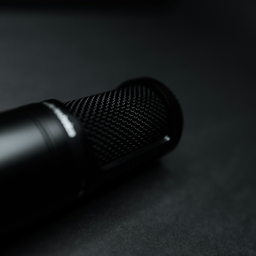 Studio microphone close up with soft bokeh background