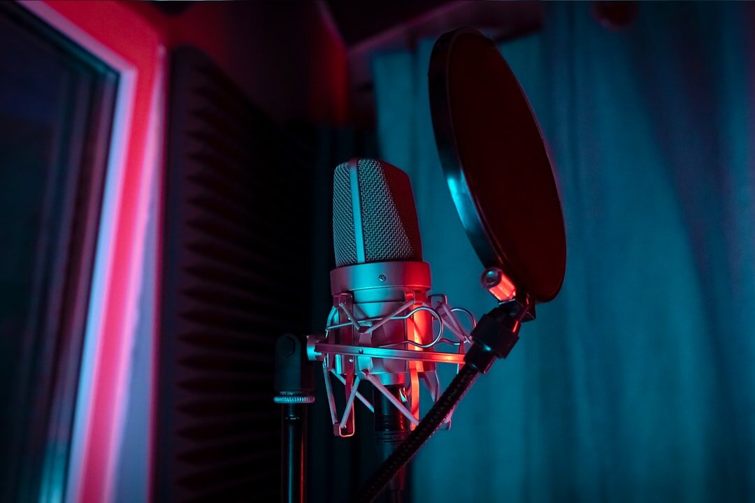Voice over recording session with microphone pop filter