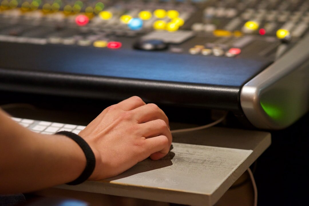Audio training workshop with students at mixing consoles