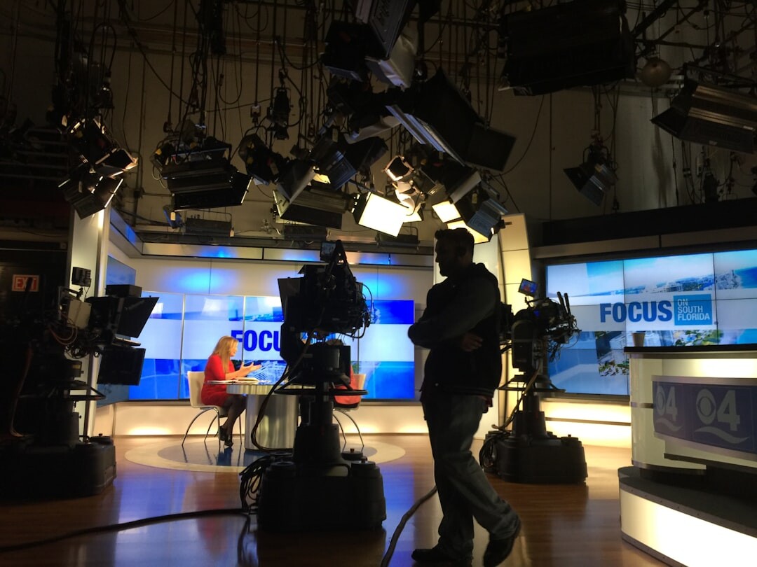Live broadcast television studio with cameras and lights